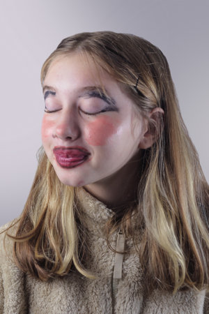 A girl's face with smudged makeupの写真素材