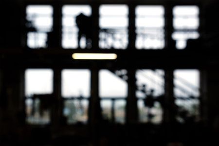 Blurred background - Abstract blur industrial interior silhouette for background.の写真素材