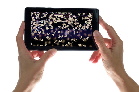 Female hands holding a smartphone with letters on the screen, isolated on a white backgroundの写真素材