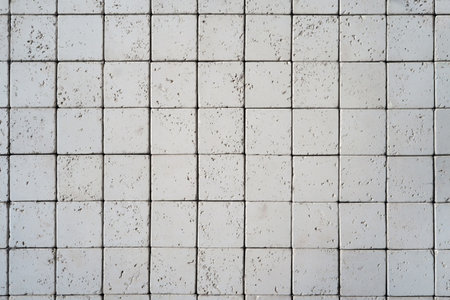 Square white stones wall backgroundの写真素材