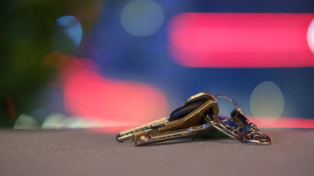 Set of keys with key ring on the ground. selective focusの写真素材