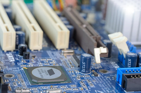 A blue electronic circuit board background, close upの写真素材