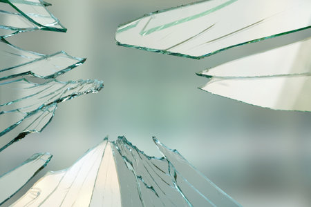Cracked and broken glass with hole