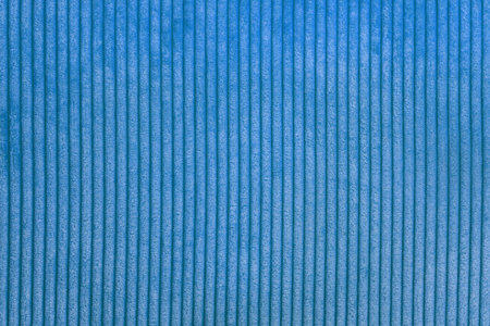 Blue corduroy fabrick background. close up
