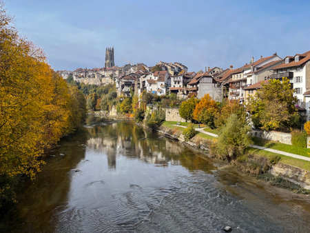 View of old swiss city Fribourg on river saane or sarine at autumnの写真素材