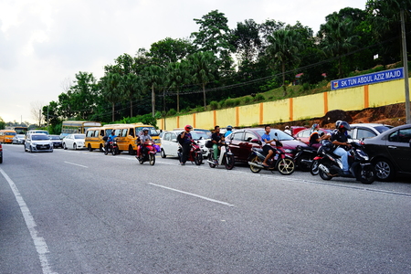 Parents & hired transport waiting their  child and student before school time finish at in front of schoolのeditorial素材