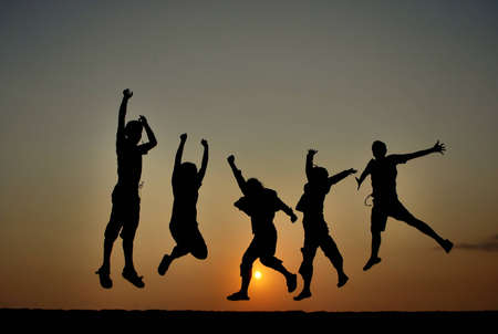 Morning happiness and freedom on sunrise at beachの写真素材