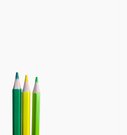 Colored pencils without a background, green, yellow and light green on a white background, space for insertion, space for textの写真素材