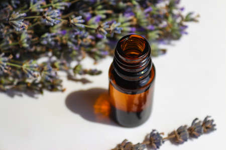 Lavender essential oil close-up. Natural cosmetic for face and body. Aromatherapy. Selective focus.