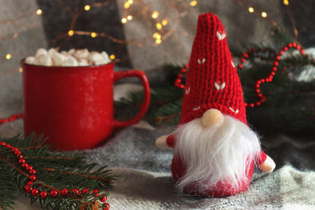 Christmas festive background with gift box, Christmas decorations, Christmas tree branches, and...