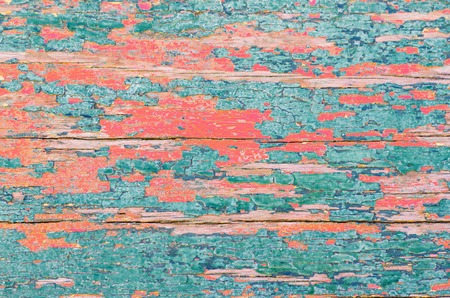 The rough wooden surface in the coral colorの写真素材