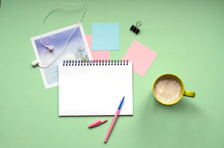 Creative desktop. Post-it stickers, a Cup of coffee. Musicの写真素材