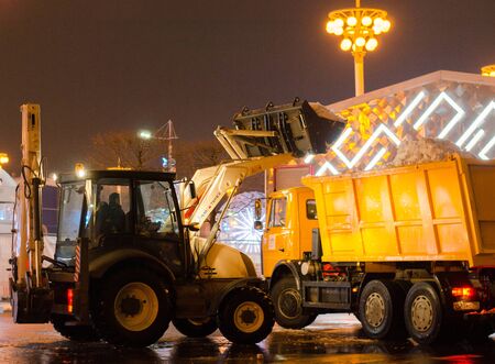 winter in Moscow. VDNH. Snow removal in the late evening.