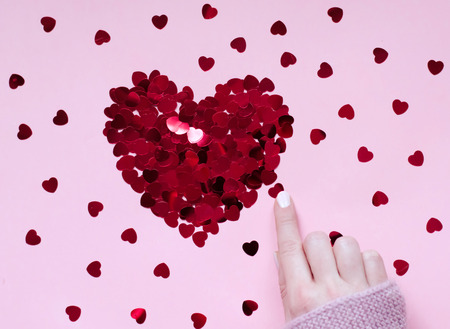 Heart of sequins on a pink background. 14 Feb. Brilliant pictureの写真素材