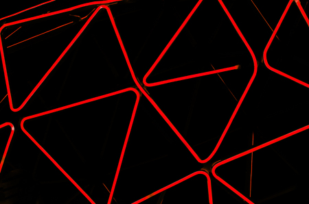 Rhythmic neon lines on a black background. Abstract picture. disco styleの写真素材