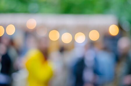 Blurred background. Blurred background on the street with lights-lanterns. Street festival. Festive atmosphere.の写真素材