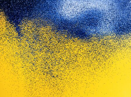 Abstract blue and yellow background. Bright background for your design. Contrasting color.の写真素材