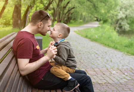 Dad and son on a walk with dad.の写真素材