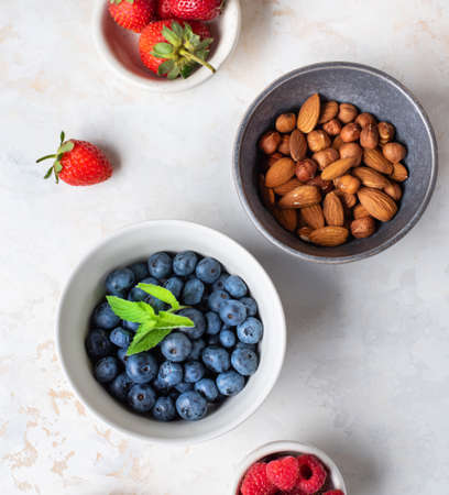 Healthy diet. Useful ingredients. Delicious summer berries. Useful nuts.の写真素材