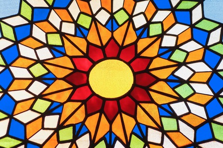 stained glass window in the form of the sun