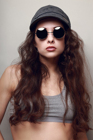 Sexy female model in fashion sun glassesの写真素材
