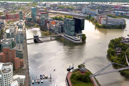High top view of river and city buildings from Dusseldorf Rhine Tower. Germanyのeditorial素材