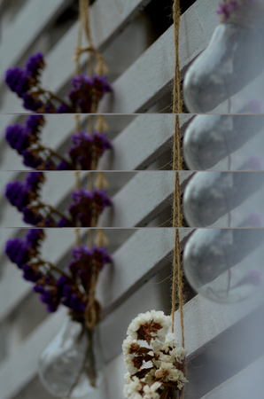 Wedding decor, bottles with flowers on green background