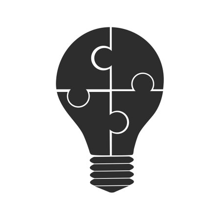 Light bulb icon from a puzzle piece. vector isolated on white background. vectorのイラスト素材