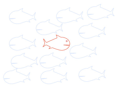 Red fish swim in a unique direction. the courage to be different. vector illustrationのイラスト素材