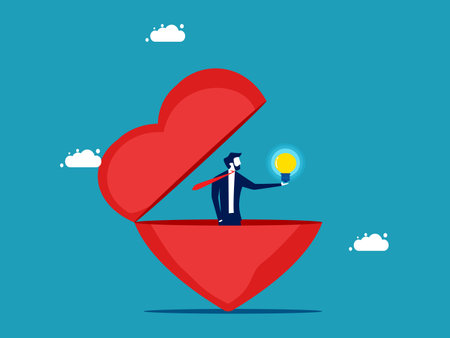 Businessman finds light in the heart. The concept of light in the mind. vector illustrationのイラスト素材