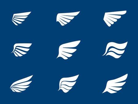 Wings icon set. Symbol of white wings. Pair of wings. Vector illustrationのイラスト素材