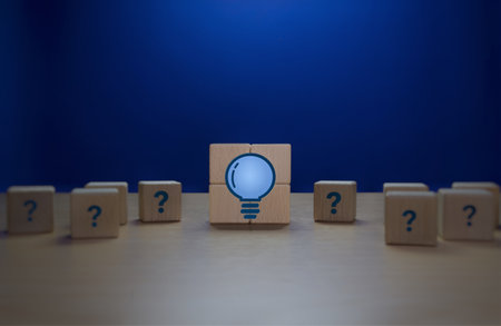 Problem Solving, New Knowledge, Wisdom, Light Bulb Surrounded by Question Marksの写真素材