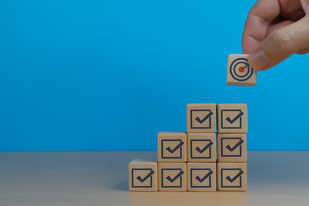 Achievement of goals .Tick the wooden block to complete the checklistの写真素材
