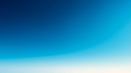 Simple clear sky with a clean gradient from light blue to whiteの素材