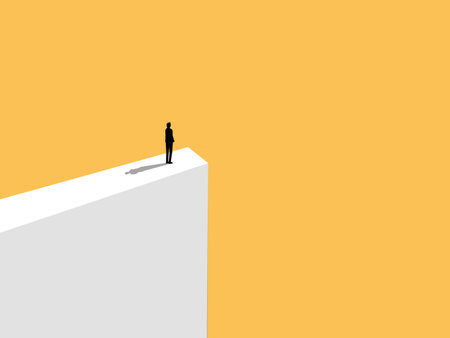 man standing on a high cliff