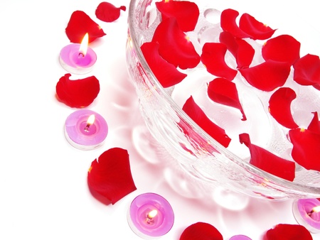 spa lit candles lilies flowers health-care treatmentの写真素材