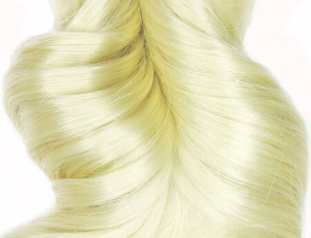 blond hair wave isolated on white backgroundの写真素材
