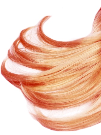 gingery hair strands isolated on white backgroundの写真素材