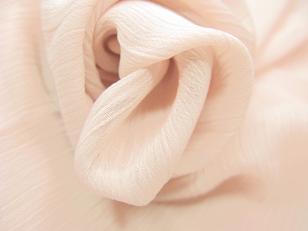 beige silk texture abstract backgroundの写真素材