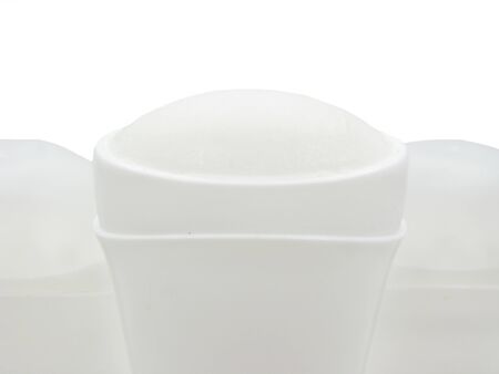 three deodorants isolated on whiteの写真素材