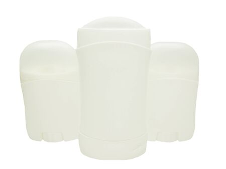 three deodorants isolated on whiteの写真素材