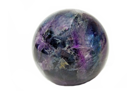 round fluorite mineral crystal isolated