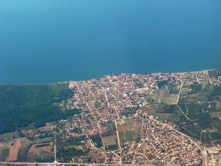 panoramic view of seaside city out of plane's windowの写真素材