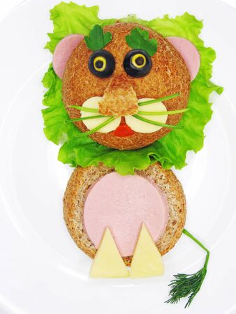 creative sandwich with cheese and salame lion shapeの写真素材