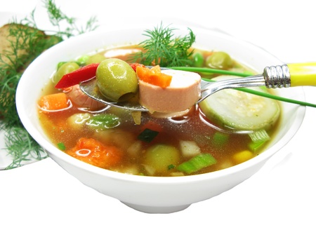 vegetable soup with sausage pea and olivesの写真素材
