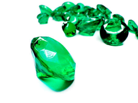 emerald gem stones crystals isolated on white backgroundの写真素材