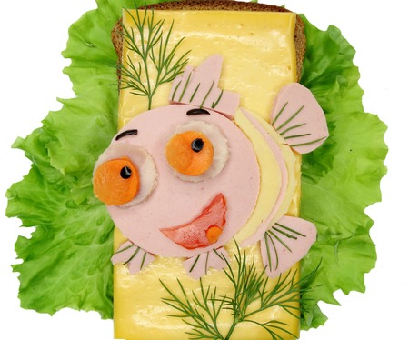 creative sandwich with cheese and salami fish formの写真素材