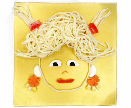 creative vegetable food meal with spaghetti girl formの写真素材