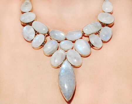 moon stone gemstone beads isolated on white backgroundの写真素材