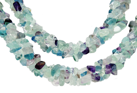 fluorite gemstone beads isolated on white backgroundの写真素材